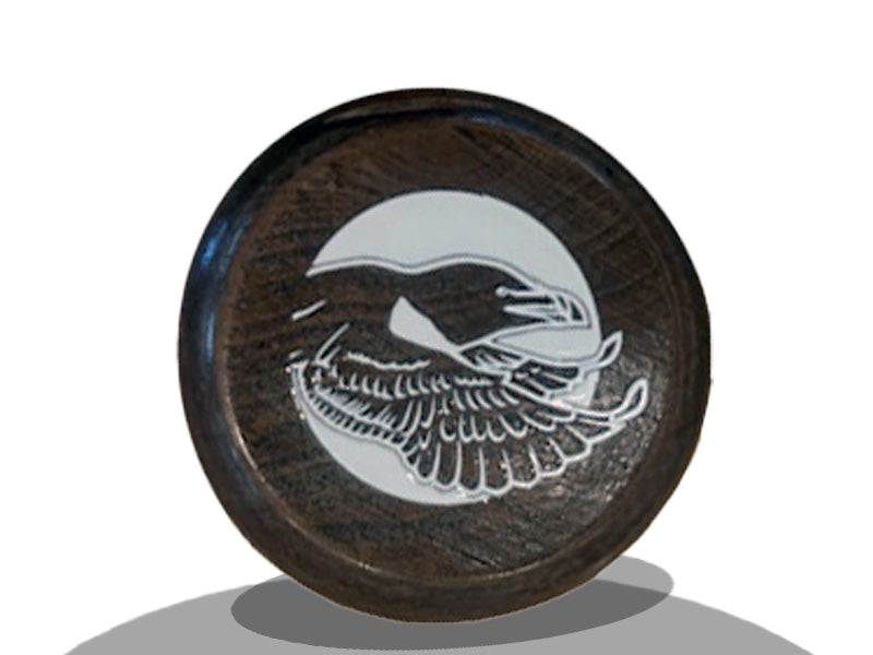 Close-up of the knob on a Razorbill bat featuring the bird logo design