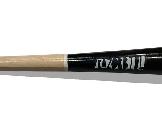 Razorbill Bats wood baseball bat featuring a hard edge black barrel paired with a natural grain handle. A sleek, high-contrast design built for performance and style.