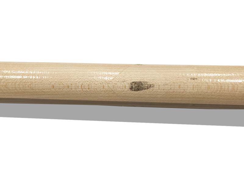 Close-up of the ink spot on a Razorbill Bats wood baseball bat, indicating certified slope of grain.