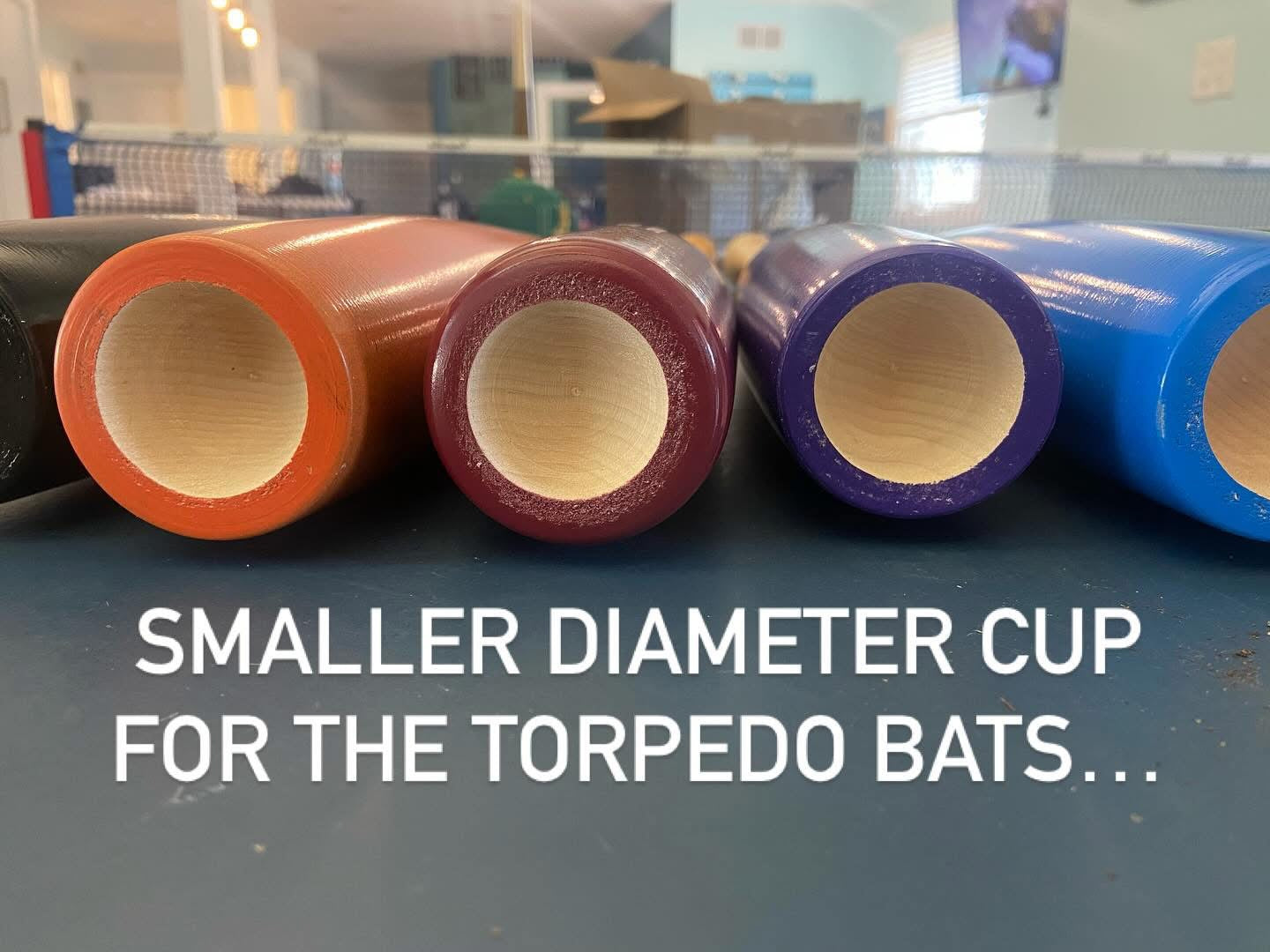 Custom Razorbill bat featuring a sleek torpedo design with a small cupped end.