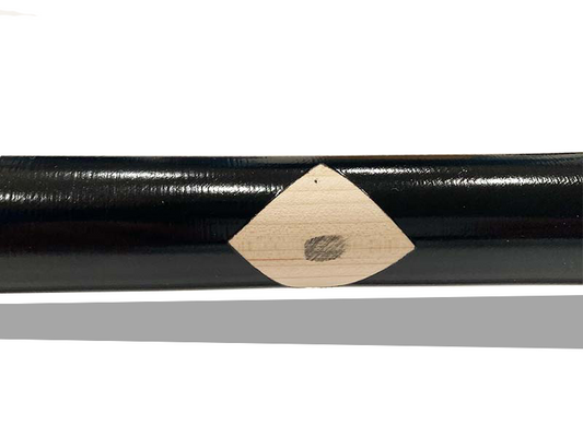 Close-up of ink spot detail on the barrel of a Razorbill wood bat