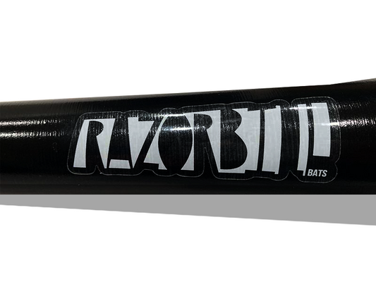 Razorbill Bats logo displayed on the barrel of a black wood baseball bat.