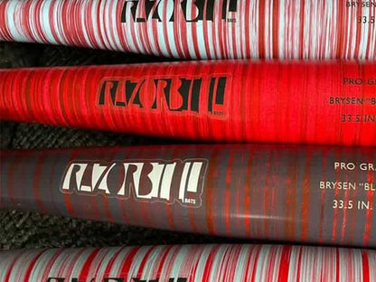 Red striped wood bats featuring the Razorbill logo on the barrel, combining bold design with game-ready performance.