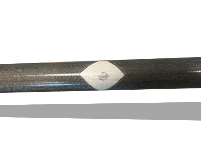Close-up of ink spot detail on the handle of a Razorbill wood bat